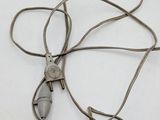 a cord with a plug attached to it on a white surface