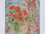 une image représentant un tableau où l'on voit une femme avec des fleurs dans un vase