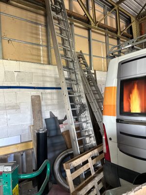 a white van that has a fire in it
