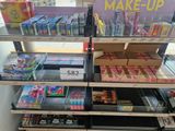 a display of makeup products for sale in a store