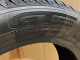 an image of a close up of a tire on a wooden floor