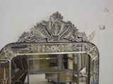 a mirror that is hanging on the wall in the room