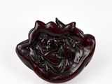 an image of a small bowl with a flower on it