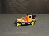 a small toy car that is sitting on a table