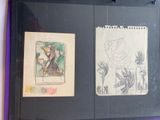 two drawings on the wall of a room
