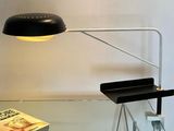 a lamp that is sitting on a glass table