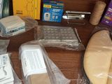 many items that are sitting on a wooden table