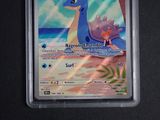 a close up of a pokemon card on a table
