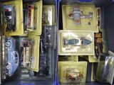a blue box filled with toy cars and other toys