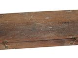 an old wooden box with a handle on a white background