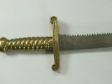 a knife that is laying on top of a table