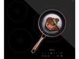 an image of a steak on a frying pan on a stove top