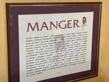 a picture of a sign on the wall of a bathroom