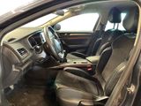 the interior of a car with the door open showing the steering wheel and dashboard