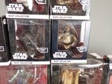 several star wars action figures are stacked on top of each other