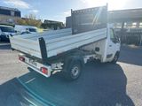 a white truck that is parked in a parking lot
