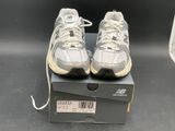 new balance shoes in box with price tag on the side
