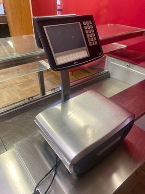 an image of a check in counter with a laptop on it
