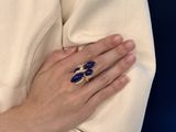 a woman with a ring on her left hand and a ring on her right hand
