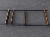 an image of a bed frame that is laying on the ground