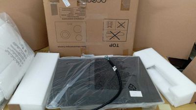 a box that has a laptop in it on a table