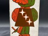 an image of a cardboard box with a picture of a man in a green hat and green pants