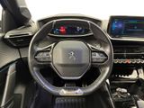 the interior of a car with a steering wheel and dashboard controls