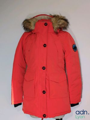 an image of a red parka with a hood and fur on it