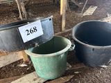 two buckets that are sitting next to each other