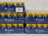 several packs of water are stacked on top of each other