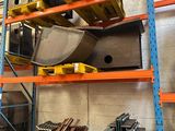 many different types of metal items on the shelves
