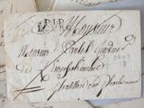 many old letters that have been written on a piece of paper