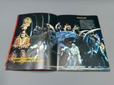 an open book with a picture of a group of people on it