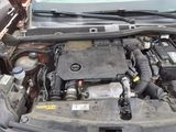 the engine of a car with its hood open and the hood open