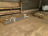 a pile of steel bars in a warehouse area