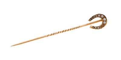 an image of a gold and diamond stick pin