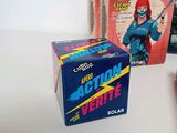 a box of action verite next to a box of action verite