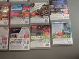 a lot of video games that are on the table
