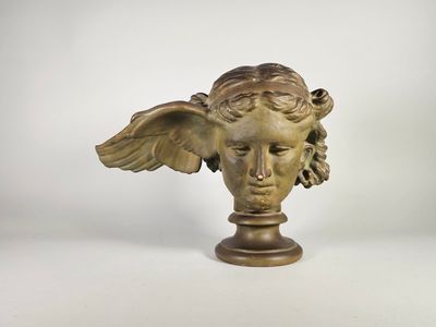D'après l'Antique. Hypnos, dieu du sommeil. Tête en plâtre patiné vert