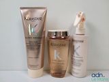 a bottle of kerastase and a bottle of lotion next to each other