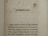 an old book with a black and white picture on it