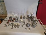 a table with a lot of silver objects on it