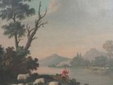 a painting on the wall of a room with a painting of a man and a dog