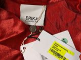 a close up of a red jacket with a tag on it