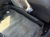 a car that has a seat in the back of it