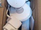 a box with a camera inside of it on the floor
