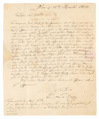 une lettre écrite à l'encre noire sur une feuille de papier