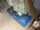 a pile of luggage sitting on the floor next to a door