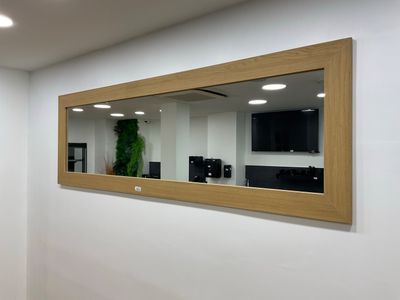 a large mirror on the wall in the room