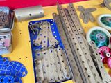 many different types of sewing supplies laid out on a table